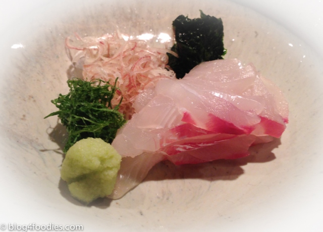 Sea Bream garnished with fresh seaweed and Japanese herbs and Snow Crab topped with crab innards with broth jelly.