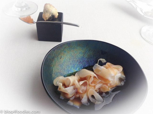 Roasted squid on its juice and its ink sponge