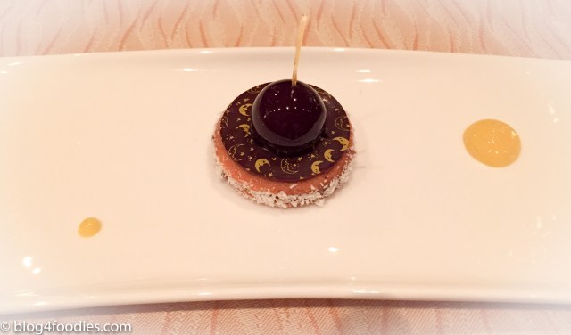 Persimmons, buffalo ricotta cheese, cocoa and cranberries