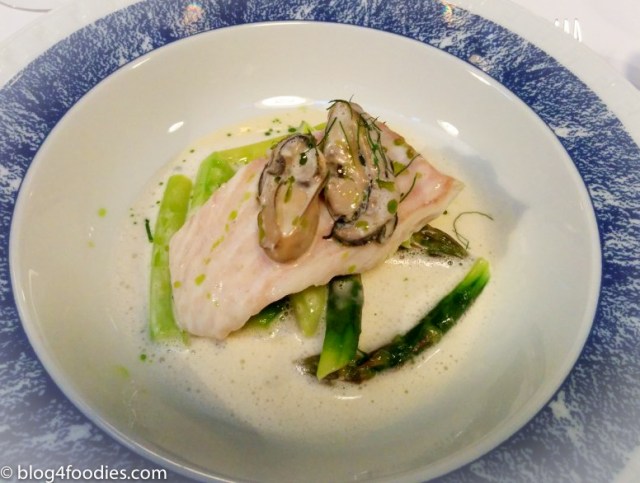 Butter poached turbot, asparagus, poached oysters, oyster sauce