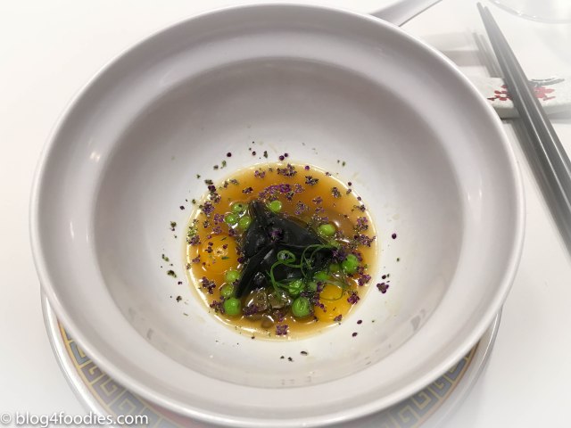 WontonXO soup… Guinea fowl dumpling with shitake, ginseng soup and tear peas.