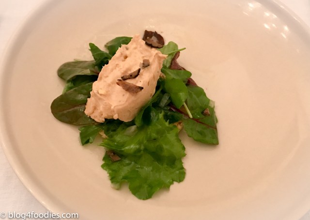 Foie Gras parfait served a little truffle salad on fried peasant bread